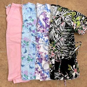 Lot of 4 scrub tops. Size XS